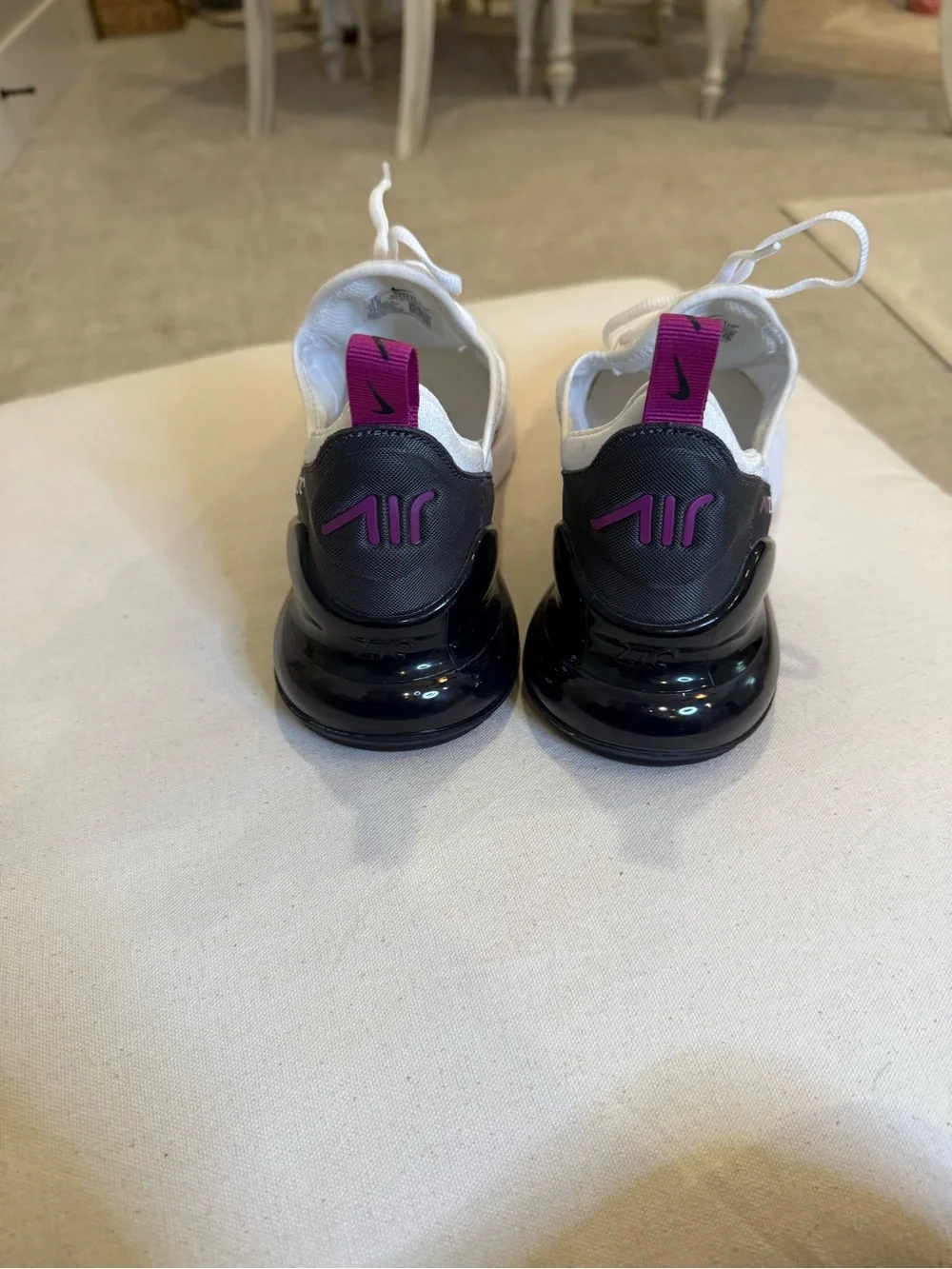 Nike Women's White Sneakers with Pink Swoosh